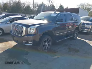 2015 GMC Yukon XL Denali with VIN 1GKS2JKJ9FR634771, listed as a IAAI auction lot 41676218 with 73,271 mi miles. Bid and sale history available at carsss.com. Image 17.