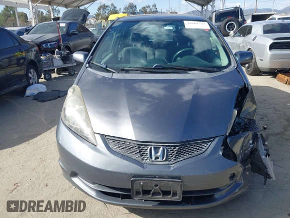 2013 Honda Fit with VIN JHMGE8H36DC056640, listed as a IAAI auction lot 41969727 with 94,564 mi miles. Bid and sale history available at carsss.com. Image 12.