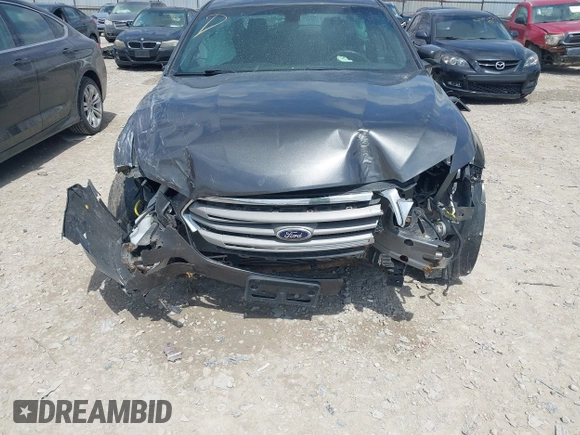 2015 Ford Taurus SEL with VIN 1FAHP2E81FG122378, listed as a IAAI auction lot 42081001 with 159,853 mi miles and . Bid and sale history available at carsss.com. Image 6.