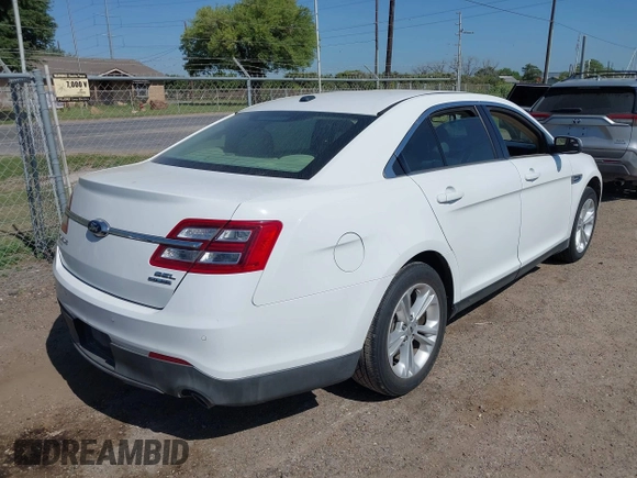 2015 Ford Taurus SEL z VIN 1FAHP2E8XFG196270, wystawiony jako IAAI lot #42007068 z przebiegiem 150 093 mil mil oraz . Historia ofert i sprzedaży dostępna na DreamBid. Obrazek 4.