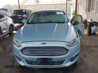 2014 Ford Fusion SE Hybrid with VIN 3FA6P0LU8ER283409, listed as a IAAI auction lot 40984629 with 206,605 mi miles. Bid and sale history available at carsss.com. Image 12.