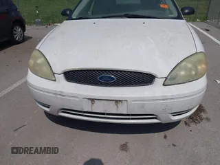 2005 Ford Taurus SE with VIN 1FAFP53255A304254, listed as a IAAI auction lot 42647002 with Not provided miles and . Bid and sale history available at DreamBid. Image 6.