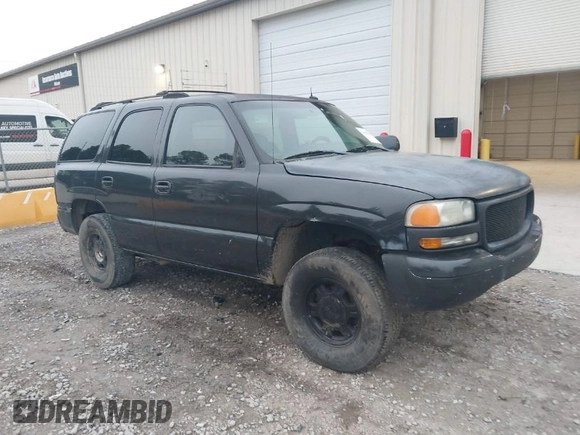 2003 GMC Yukon SLT with VIN 1GKEC13ZX3R181111, listed as a IAAI auction lot 41496338 with 307,996 mi miles. Bid and sale history available at carsss.com. Image 1.