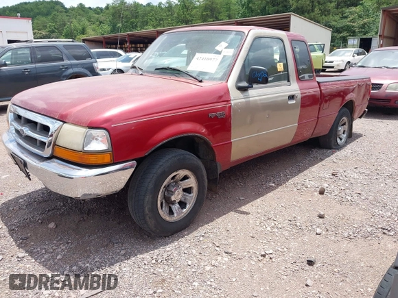 1999 Ford Ranger XLT with VIN 1FTYR14X4XTA84905, listed as a IAAI auction lot 42410977 with 272,309 mi miles and . Bid and sale history available at DreamBid. Image 2.