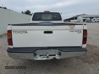 1999 Toyota Tacoma z VIN 4TAVL52N6XZ555376, wystawiony jako Copart lot #85763154 z przebiegiem 229 914 mil mil oraz Nie do naprawy • Non repairable. Historia ofert i sprzedaży dostępna na DreamBid. Obrazek 6.