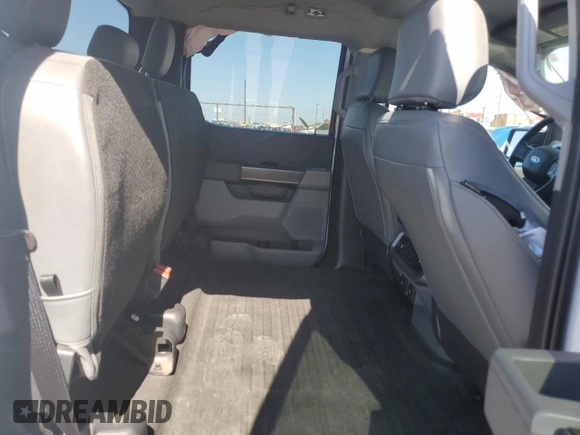 2023 Ford F-150 Lightning Pro с VIN 1FTVW1EL2PWG13712, выставлен на аукционе Copart как лот 56950955 с пробегом 60 605 миль миль и Списание • Salvage title. История ставок и продаж доступна на DreamBid. Изображение 10.