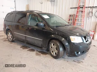 2010 Dodge Grand Caravan Crew with VIN 2D4RN6DX1AR438135, listed as a IAAI auction lot 41734378 with 57,041 mi miles and . Bid and sale history available at DreamBid. Image 1.