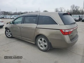 2012 Honda Odyssey Touring with VIN 5FNRL5H9XCB078399, listed as a Copart auction lot 52360165 with 174,819 mi miles and Salvage Title. Bid and sale history available at DreamBid. Image 2.