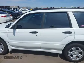 2007 Subaru Forester X with VIN JF1SG63667H742850, listed as a IAAI auction lot 42163492 with 170,787 mi miles. Bid and sale history available at carsss.com. Image 14.
