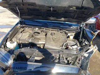 2018 Toyota Tacoma SR with VIN 5TFCZ5ANXJX124991, listed as a IAAI auction lot 41136867 with 57,980 mi miles and . Bid and sale history available at carsss.com. Image 10.