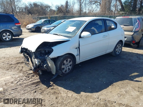 2008 Hyundai Accent GS with VIN KMHCM36C68U055850, listed as a IAAI auction lot 41590651 with 198,827 mi miles. Bid and sale history available at carsss.com. Image 2.