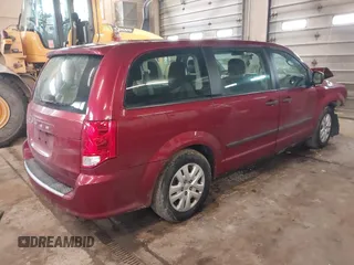 2014 Dodge Grand Caravan SE with VIN 2C4RDGBG5ER379315, listed as a IAAI auction lot 41673071 with 168,569 mi miles and . Bid and sale history available at DreamBid. Image 4.