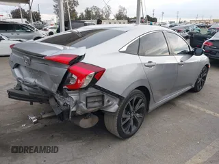 2019 Honda Civic Sport with VIN 2HGFC2F84KH576622, listed as a IAAI auction lot 41494019 with 87,495 mi miles and . Bid and sale history available at DreamBid. Image 4.
