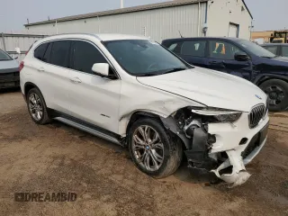 2016 BMW X1 xDrive28i z VIN WBXHT3C38G5F66931, wystawiony jako Copart lot #56720455 z przebiegiem 118 134 mil mil oraz Szkoda całkowita • Salvage title. Historia ofert i sprzedaży dostępna na DreamBid. Obrazek 4.