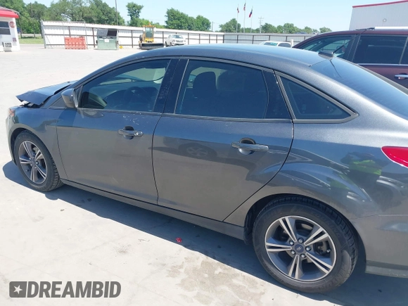 2018 Ford Focus SE with VIN 1FADP3FE3JL204220, listed as a IAAI auction lot 41972960 with 62,682 mi miles and . Bid and sale history available at DreamBid. Image 14.