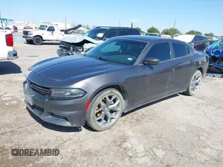 2015 Dodge Charger SXT with VIN 2C3CDXHG9FH825135, listed as a IAAI auction lot 42172793 with 169,324 mi miles and . Bid and sale history available at DreamBid. Image 2.