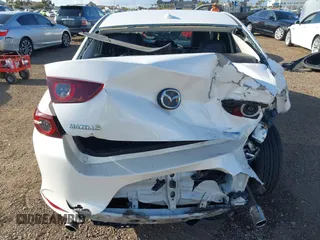 2020 Mazda 3 Premium with VIN 3MZBPAEM3LM132772, listed as a IAAI auction lot 42067269 with 53,751 mi miles and . Bid and sale history available at DreamBid. Image 6.