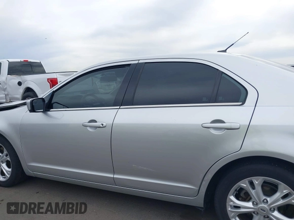 2012 Ford Fusion SE with VIN 3FAHP0HA3CR291485, listed as a IAAI auction lot 42029338 with 153,217 mi miles and . Bid and sale history available at DreamBid. Image 14.