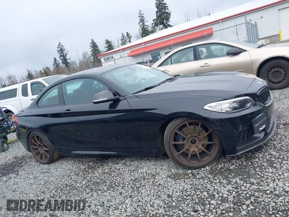 2015 BMW 2 Series M235i with VIN WBA1J7C55FV358527, listed as a IAAI auction lot 41839031 with 81,900 mi miles and . Bid and sale history available at carsss.com. Image 13.