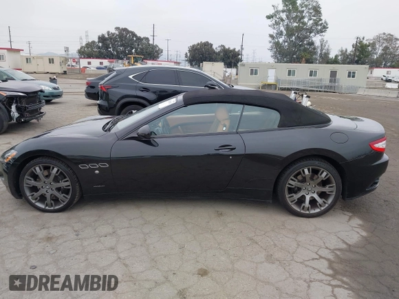 2014 Maserati GranTurismo Sport with VIN ZAM45MMA4E0078412, listed as a IAAI auction lot 42239631 with 31,392 mi miles and . Bid and sale history available at DreamBid. Image 13.