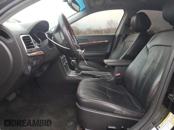 2012 Lincoln MKZ z VIN 3LNHL2JC3CR816733, wystawiony jako Copart lot #51353215 z przebiegiem 149 256 mil mil oraz Szkoda całkowita • Salvage title. Historia ofert i sprzedaży dostępna na DreamBid. Obrazek 7.