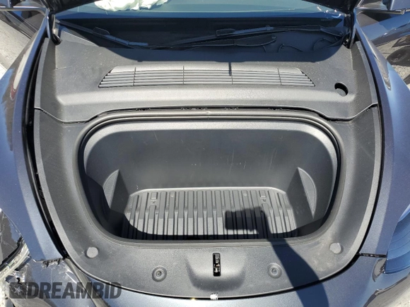 2025 Tesla Model Y Long Range with VIN 7SAYGAEEXSF253326, listed as a Copart auction lot 49527965 with 5,803 mi miles and Salvage Title. Bid and sale history available at DreamBid. Image 14.