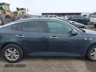 2016 Kia Optima LX with VIN KNAGT4L37G5070799, listed as a IAAI auction lot 41963239 with 116,308 mi miles. Bid and sale history available at carsss.com. Image 13.