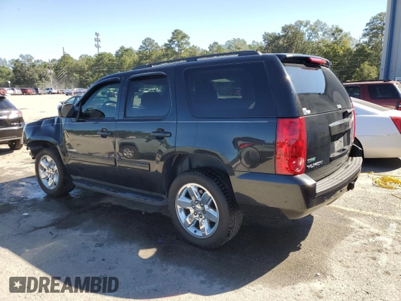 2011 GMC Yukon SLE with VIN 1GKS1AE02BR213992, listed as a Copart auction lot 75609704 with 133,536 mi miles and Salvage Title. Bid and sale history available at carsss.com. Image 2.