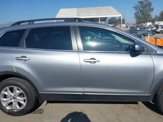 2013 Mazda CX-9 Touring z VIN JM3TB2CVXD0416533, wystawiony jako IAAI lot #42223034 z przebiegiem 135 990 mil mil oraz . Historia ofert i sprzedaży dostępna na DreamBid. Obrazek 13.