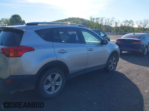 2013 Toyota RAV4 XLE with VIN JTMRFREV9DD013682, listed as a IAAI auction lot 42142414 with 202,680 mi miles. Bid and sale history available at carsss.com. Image 4.