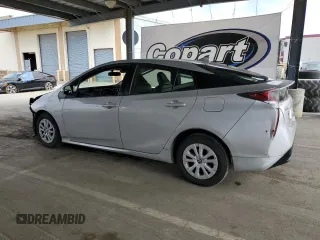 2016 Toyota Prius Two with VIN JTDKBRFU1G3017142, listed as a Copart auction lot 54553785 with 129,857 mi miles and Salvage Title. Bid and sale history available at DreamBid. Image 2.