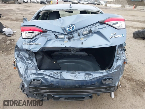 2023 Toyota Corolla Hybrid LE with VIN JTDBCMFE8PJ013271, listed as a IAAI auction lot 42099797 with 14,080 mi miles and . Bid and sale history available at carsss.com. Image 6.