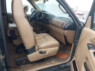 1999 Dodge Ram 1500 with VIN 3B7HF13Z4XM579695, listed as a IAAI auction lot 41795036 with 117,785 mi miles. Bid and sale history available at carsss.com. Image 5.