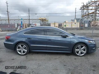 2013 Volkswagen CC Sport with VIN WVWBP7AN3DE571837, listed as a IAAI auction lot 41784447 with 156,834 mi miles. Bid and sale history available at carsss.com. Image 13.