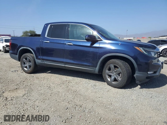 2021 Honda Ridgeline RTL-E with VIN 5FPYK3F75MB001663, listed as a Copart auction lot 61952705 with 52,093 mi miles and Salvage title. Bid and sale history available at DreamBid. Image 4.