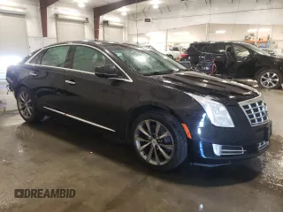 2014 Cadillac XTS Luxury with VIN 2G61N5S33E9246454, listed as a Copart auction lot 63100655 with 110,544 mi miles and Salvage title. Bid and sale history available at DreamBid. Image 4.
