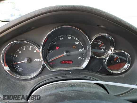 2006 Pontiac G6 1SV z VIN 1G2ZF55BX64225352, wystawiony jako Copart lot #57915805 z przebiegiem 194 400 mil mil oraz Szkoda całkowita • Salvage title. Historia ofert i sprzedaży dostępna na DreamBid. Obrazek 9.