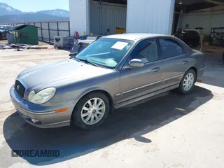 2003 Hyundai Sonata GLS with VIN KMHWF35H03A895363, listed as a IAAI auction lot 42149203 with 152,173 mi miles. Bid and sale history available at carsss.com. Image 2.