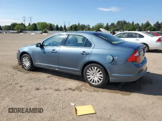 2012 Ford Fusion Hybrid z VIN 3FADP0L33CR288819, wystawiony jako Copart lot #56697025 z przebiegiem 65 486 mil mil oraz Szkoda całkowita • Salvage title. Historia ofert i sprzedaży dostępna na DreamBid. Obrazek 2.