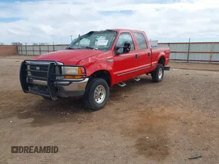 1999 Ford Super Duty F-250 XL with VIN 1FTNW21F7XEA71082, listed as a IAAI auction lot 41665200 with 210,841 mi miles. Bid and sale history available at carsss.com. Image 2.