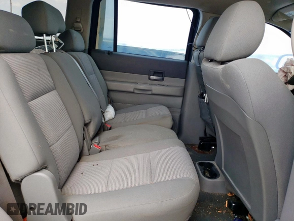 2007 Dodge Durango SLT z VIN 1D8HD48P87F581689, wystawiony jako Copart lot #54937005 z przebiegiem Nie podano mil oraz Szkoda całkowita • Salvage title. Historia ofert i sprzedaży dostępna na DreamBid. Obrazek 11.