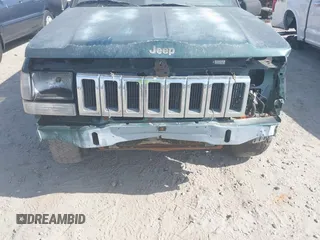 1996 Jeep Grand Cherokee Laredo with VIN 1J4FX58S9TC300710, listed as a IAAI auction lot 42073391 with 1 mi miles. Bid and sale history available at carsss.com. Image 6.