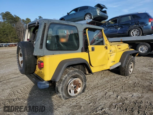 2001 Jeep Wrangler Sport with VIN 1J4FA49S21P312522, listed as a Copart auction lot 54698935 with 201,199 mi miles and Salvage Title. Bid and sale history available at carsss.com. Image 3.