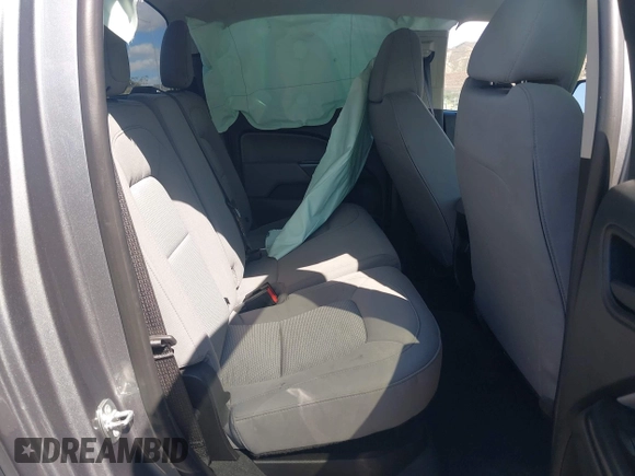 2021 Chevrolet Colorado 2WD Work Truck z VIN 1GCGSBEA5M1130412, wystawiony jako IAAI lot #41935021 z przebiegiem 56 475 mil mil oraz . Historia ofert i sprzedaży dostępna na DreamBid. Obrazek 8.