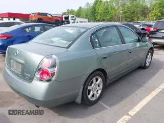 2006 Nissan Altima 2.5 S with VIN 1N4AL11D66C140098, listed as a IAAI auction lot 42099065 with 235,405 mi miles. Bid and sale history available at carsss.com. Image 4.