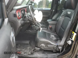 2021 Jeep Wrangler Unlimited Rubicon z VIN 1C4HJXFN1MW793064, wystawiony jako Copart lot #55643305 z przebiegiem 51 944 mil mil oraz Szkoda całkowita • Salvage title. Historia ofert i sprzedaży dostępna na DreamBid. Obrazek 7.