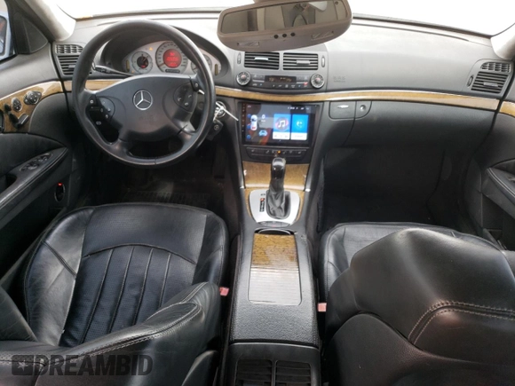 2005 Mercedes-Benz E-Class 5.5L AMG with VIN WDBUF76J05A730404, listed as a Copart auction lot 78168554 with 154,164 mi miles and Clean Title. Bid and sale history available at carsss.com. Image 8.