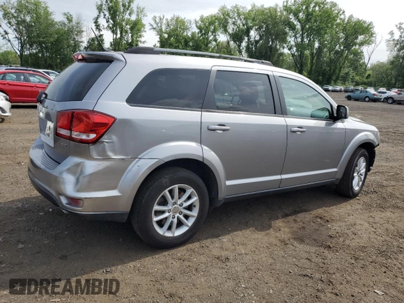 2017 Dodge Journey SXT with VIN 3C4PDDBG4HT608395, listed as a Copart auction lot 60811885 with 145,503 mi miles and Salvage title. Bid and sale history available at DreamBid. Image 3.