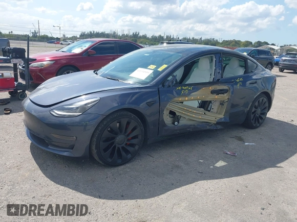 2022 Tesla Model 3 Performance with VIN 5YJ3E1EC9NF201184, listed as a IAAI auction lot 41534959 with 29,389 mi miles and . Bid and sale history available at DreamBid. Image 18.