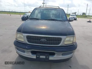 1998 Ford Expedition XLT z VIN 1FMRU17L0WLB19722, wystawiony jako IAAI lot #42477187 z przebiegiem 205 236 mil mil oraz . Historia ofert i sprzedaży dostępna na DreamBid. Obrazek 6.